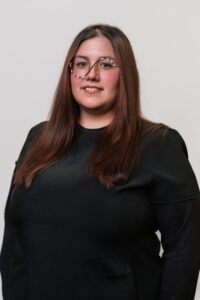 Professional female orthodontist in black attire, showcasing expertise at Comfort Dental Braces, serving Federal Way, WA, dedicated to providing braces and orthodontic care.